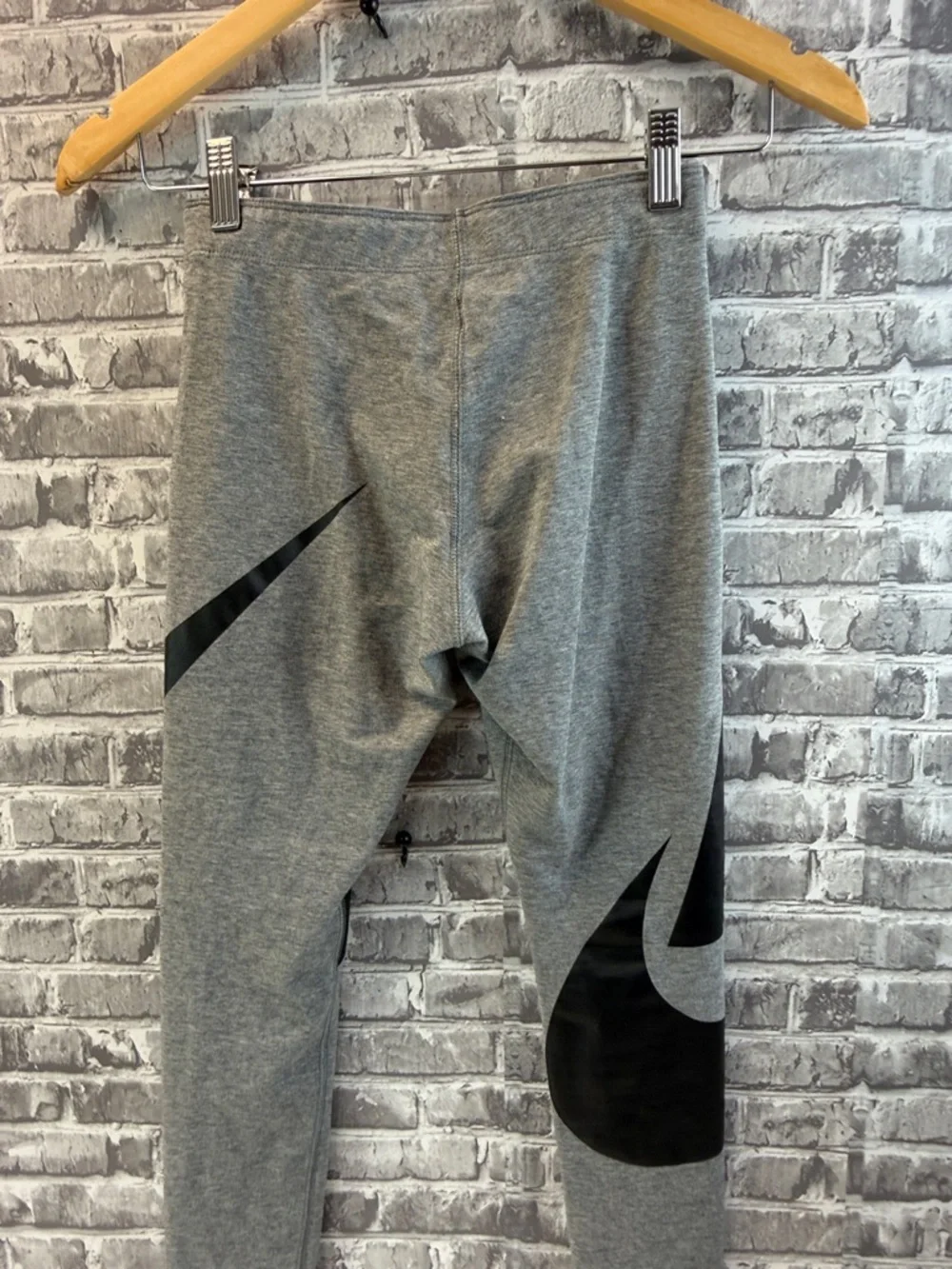 Nike Gray Athletic Leggings with Bold Black Graphic